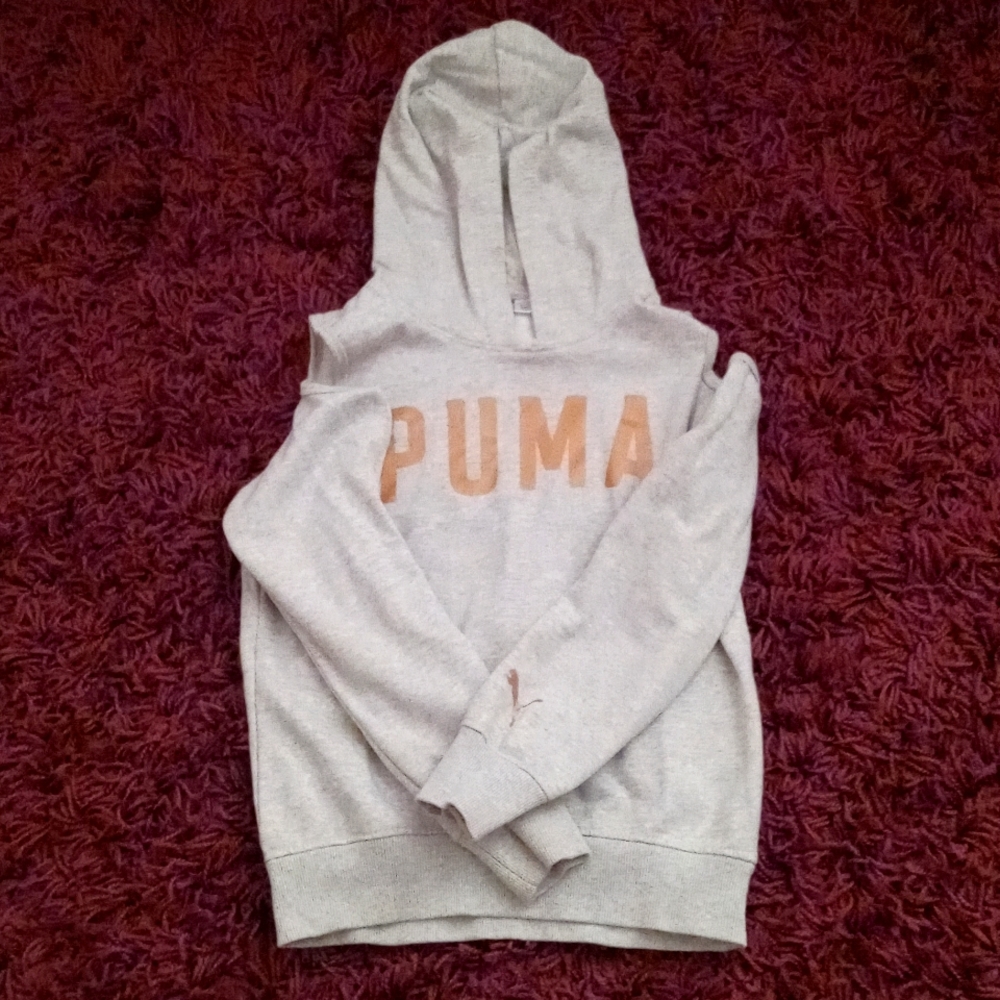 Sweater with shoulder cut out